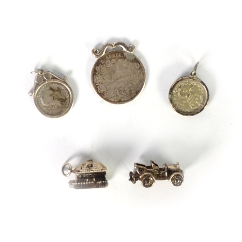 179 - THREE SILVER CHARMS, namely a vintage car; cottage (hinge-opening); the three wise monkeys and THREE... 