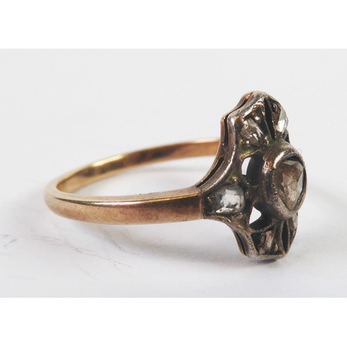 147 - ANTIQUE 14ct GOLD RING, with a rose cut diamond in a silver collet setting and having a pierced peta... 