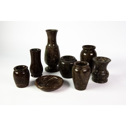 334 - CORNISH SERPENTINE: Collection of vases and pin dish in dark hues with blots and striations, 7” (18 ... 