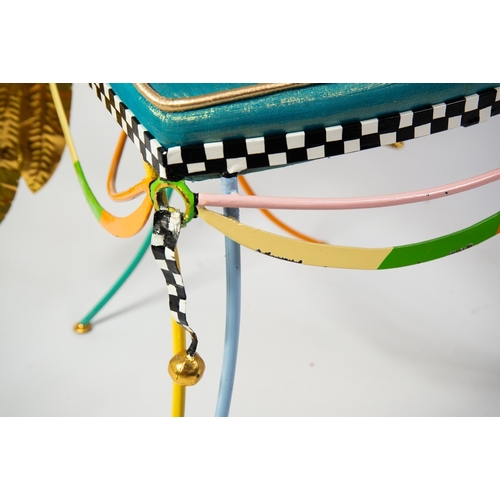 40 - TOM’S DRAG ART FOR AMARU DESIGN ‘ANGEL WINGS’ BRIGHTLY PAINTED METAL CHAIR, with oval button upholst... 