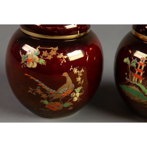 20 - TWO CARLTON WARE ROUGE ROYAL SMALL POTTERY GINGER JARS AND COVERS, one of the MIKADO pattern, the ot... 