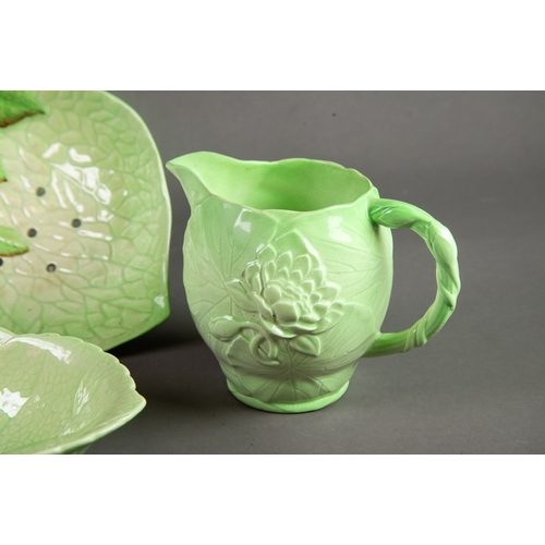 23 - FIVE PIECES OF CARLTON WARE GREEN GLAZED MOULDED POTTERY WITH FLORAL DECORATION, comprising: WATERLI... 