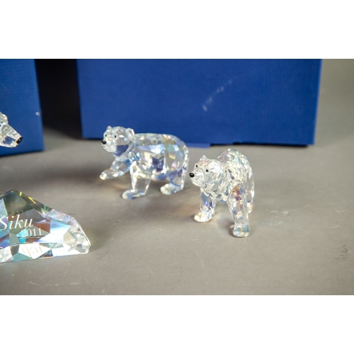 185 - BOXED SWAROVSKI ANNUAL EDITION 2011 ‘POLAR BEAR-SIKU’ GLASS MODEL AND PLAQUE, together with THE ‘CRY... 