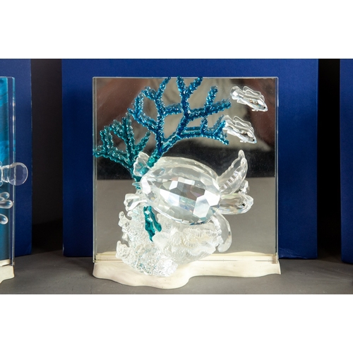 194 - THREE BOXED SWAROVSKI ‘WONDERS OF THE SEA’ GLASS ANIMAL MODELS, ‘HARMONY’, ETRNITY’ and ‘COMMUNITY’,... 