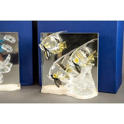 194 - THREE BOXED SWAROVSKI ‘WONDERS OF THE SEA’ GLASS ANIMAL MODELS, ‘HARMONY’, ETRNITY’ and ‘COMMUNITY’,... 