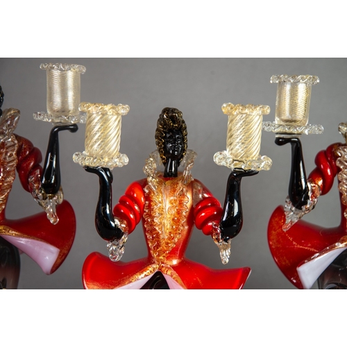 215 - PAIR OF MURANO RED, BLACK AND AVENTURINE GLASS FIGURAL TWIN LIGHT CANDLE HOLDERS, each modelled in k... 