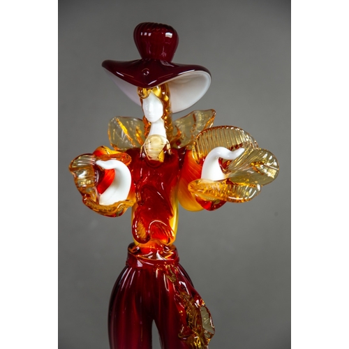 216 - THREE MURANO COLOURED AND AVENTURINE GLASS FIGURES, comprising: ONE KNEELING IN GREEN, 11 ½” (29.2cm... 