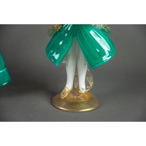 218 - PAIR OF MURANO TURQUOISE, WHITE AND AVENTURINE GLASS FIGURAL CANDLE HOLDERS, modelled as a well dres... 