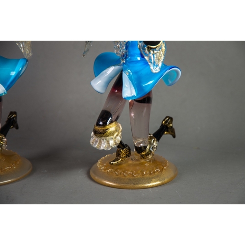 222 - PAIR OF MURANO COLOURED AND AVENTURINE GLASS FIGURAL TWIN LIGHT CANDLE HOLDERS, each modelled knelli... 