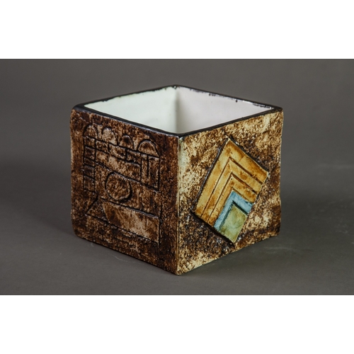 8 - TROIKA CUBE SHAPED MOULDED POTTERY VASE BY TEO BERNATOWITZ, decorated in muted tones of brown, blue ... 