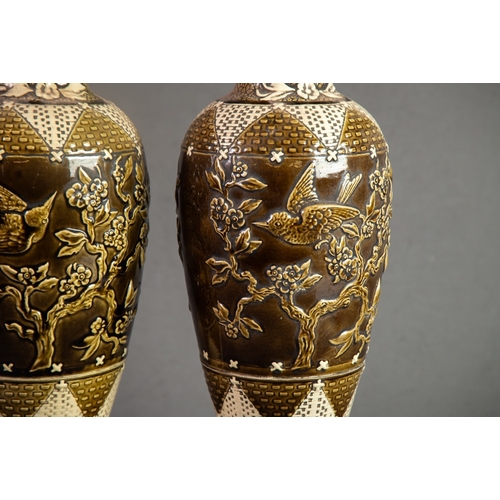 152 - PAIR OF GROVE & STARK AESTHETIC MOVEMENT MOULDED POTTERY VASES, each of slender ovoid form with ... 