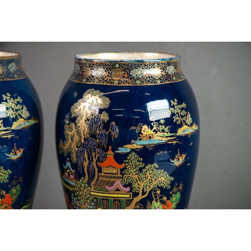 1 - PAIR OF CROWN DEVON CHINOISERIE LUSTRE DECORATED BALUSTER VASES, with figures and pagodas on islands... 