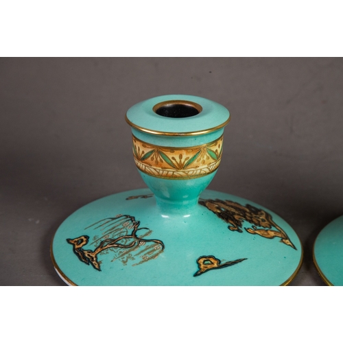 3 - PAIR OF CARLTON WARE SQUAT CANDLE HOLDERS, with turquoise ground, the campana shaped sconce with bro... 