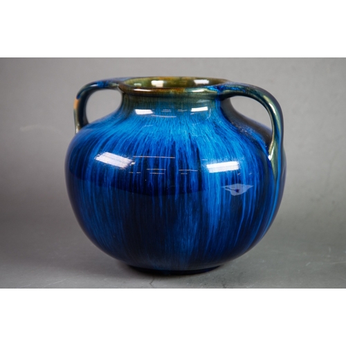 4 - BOURNE DENBY WARE LARGE AND HEAVY TWO-HANDLED OVULAR VASE, with blue streaked glaze over the brown s... 