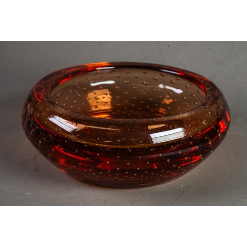 243 - CIRCA 1960's MURANO APRICOT TINTED GLASS SHALLOW BOWL with turned-over rim, enclosing multiple AIR B... 