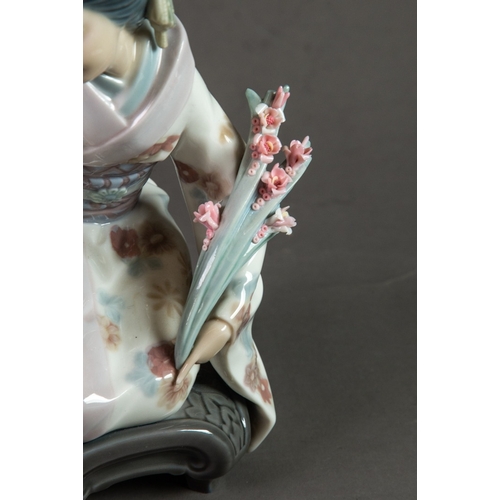 143 - LLADRO ‘KIYOKO’ PORCELAIN FIGURE OF A GEISHA, modelled kneeling, picking flowers, 7” (17.8cm) high, ... 