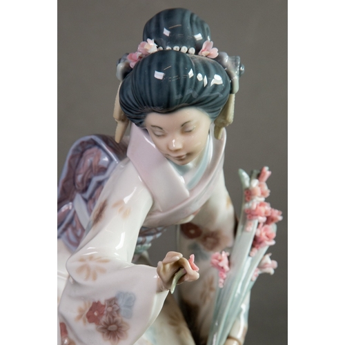 143 - LLADRO ‘KIYOKO’ PORCELAIN FIGURE OF A GEISHA, modelled kneeling, picking flowers, 7” (17.8cm) high, ... 