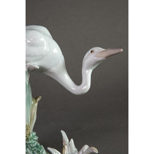 145 - LLADRO ‘HERON’S REALM’ (CROUCHING) PORCELAIN CANDLE HOLDER, 8 ½” (21.6cm) high, printed and impresse... 