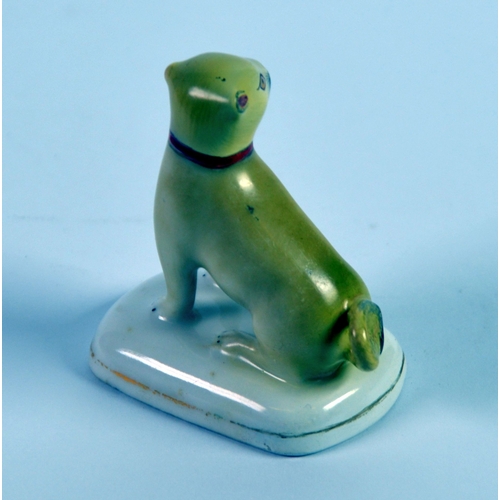 90 - CHAMBERLAIN’S WORCESTER STYLE PORCELAIN MODEL OF A SEATED PUG, on a gilt lined rounded oblong base, ... 