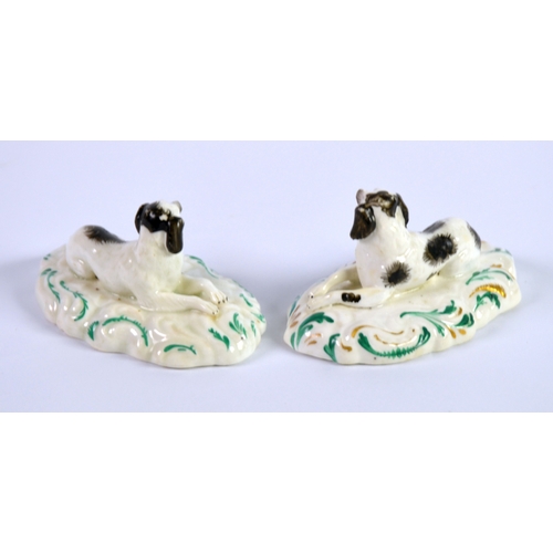 130 - PAIR OF NINETEENTH CENTURY STAFFORDSHIRE PORCELAIN MODELS OF RECUMBENT KING CHARLES SPANIELS, each w... 