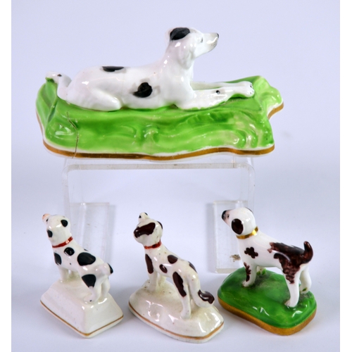 137 - FOUR NINETEENTH CENTURY STAFFORDSHIRE PORCELAIN MODELS OF DOGS, comprising: THREE SMALL STANDING MOD... 