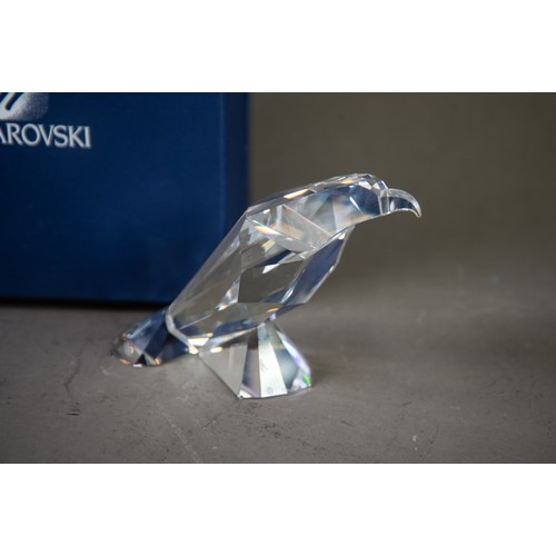 191 - BOXED SWAROVSKI GLASS MODEL OF A PERCHED EAGLE, with certificate booklet, 4 ¼” (10.8cm) high