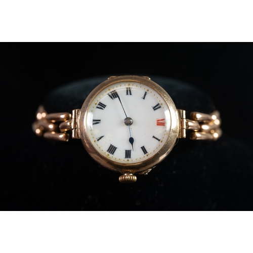 11 - LADY'S EDWARDIAN 9ct GOLD WRIST WATCH with mechanical movement, circular white porcelain roman dial,... 