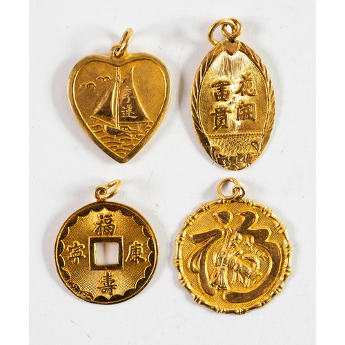 103 - FOUR CHINESE GOLD EMBOSSED PENDANTS, one in the form of a coin with centre square hole; one heart sh... 