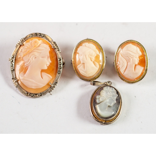 118 - THREE CONTINENTAL SHELL CARVED CAMEO BROOCH PENDANTS and another carved mother of pearl CAMEO, in si... 