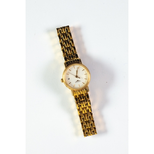 27 - LADY'S LONGINES QUARTZ GOLD PLATED BRACELET WATCH, the circular white dial with batons, centre secon... 