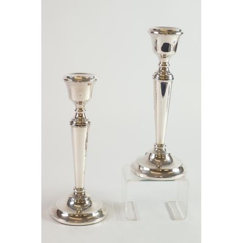 474 - PAIR OF WEIGHTED SILVER CANDLESTICKS, each of tapering form with beaded border and circular base, 8 ... 