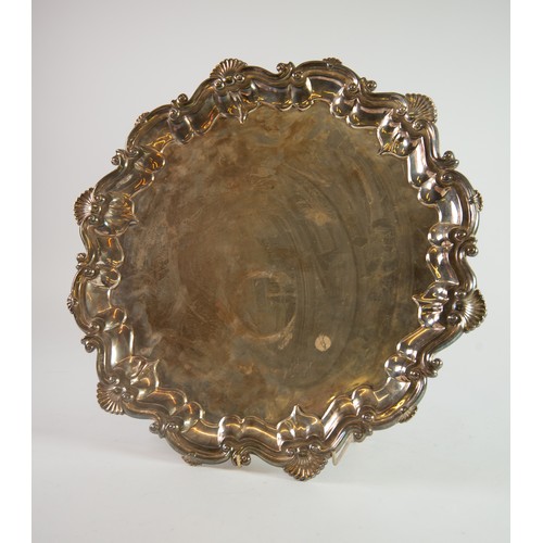 533 - CHIPPENDALE STYLE ELECTROPLATED SALVER, with shell capped moulded border and scroll feet, 16 ½” (42c... 