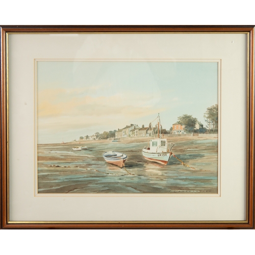 286 - P J HARGREAVES (TWENTIETH/TWENTY FIRST CENTURY)WATERCOLOUR Coastal town at low tide with small boats... 