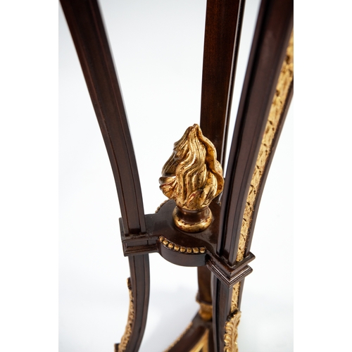 62 - BRIGHTS OF NETTLEBED REGENCY STYLE CARVED DARK MAHOGANY AND PARCEL GILT RAM'S HEAD TORCHERE, with ci... 