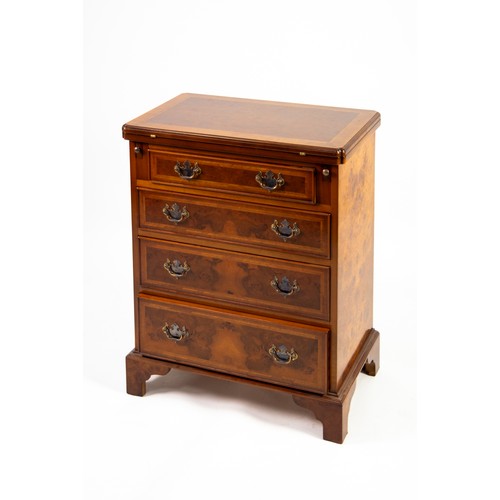 69 - GEORGIAN STYLE MAHOGANY AND BURR WALNUT VENEERED SMALL CHEST OF FOUR GRADUATED LONG DRAWERS, having ... 