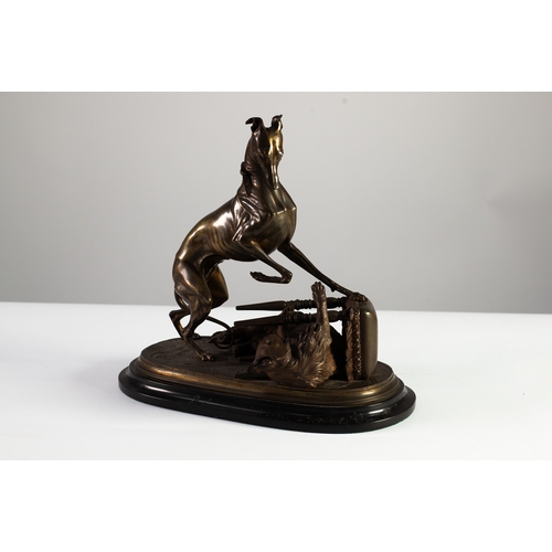 46 - AFTER P J MENE, PATINATED BRONZE GROUP, modelled as a whippet cornering a long haired cat beneath an... 