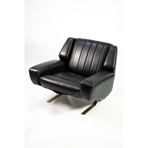 109 - MID-CENTURY DESIGN: Late 20th century black vinyl and alloy armchair in the mid-century style, possi... 