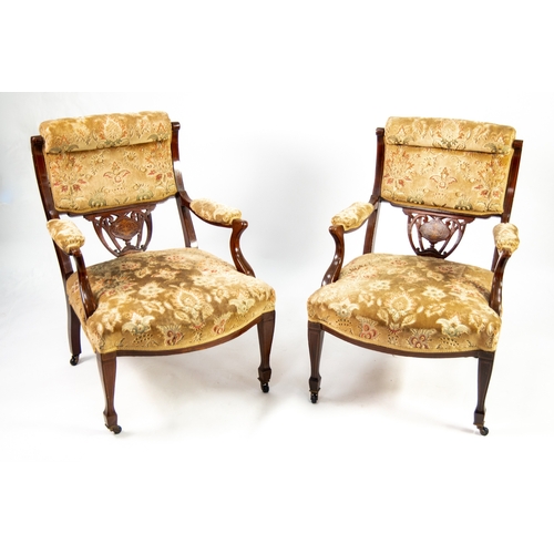 102 - PARLOUR CHAIRS: Pair of Edward VII mahogany and marquetry parlour armchairs with scrolling upholster... 