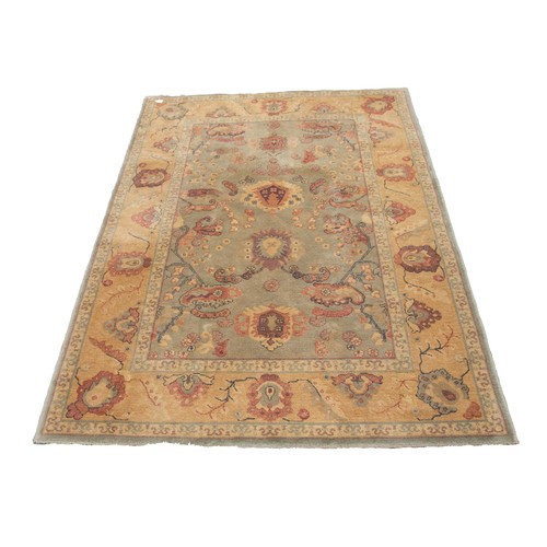 8 - ABBEY HAND MADE CARPETS LTD BELGIUM ALL WOOL PILE ISMIR EASTERN PATTERN BORDERED RUG with pale green... 