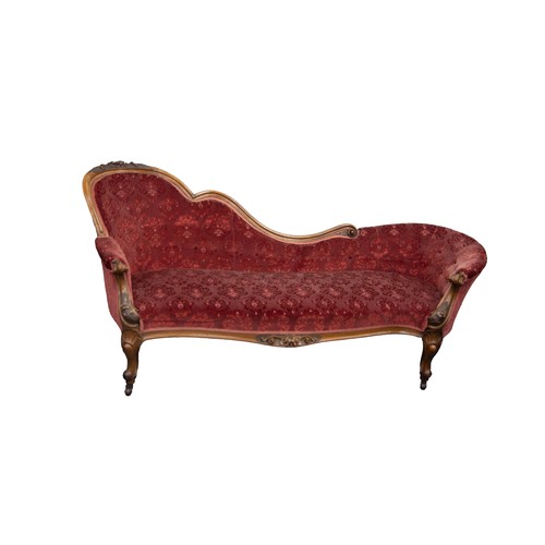 96 - VICTORIAN CARVED WALNUT CHAISE LONGUE, the moulded show wood frame with shaped back, carved in high ... 