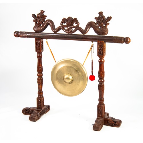 91 - LATE 20TH CENTURY INDONESIAN CEREMONIAL GONG FROM THE 'GONG FACTORY BOGOR, INDONESIA', suspended fro... 