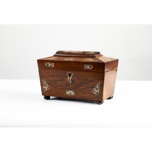 45 - REGENCY ROSEWOOD VENEERED TEA CADDY, sarcophagus shaped, with mother-of-pearl inlay to the lid and f... 