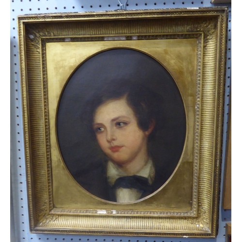 210 - BRITISH SCHOOL (CIRCA 1840) OIL PAINTING ON RE-LINED CANVAS Portrait of a young man in a painted ova... 