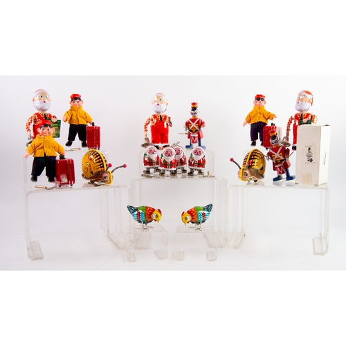 378 - THREE BOXED TIN PLATE & PLASTIC LITTLE TRAVELLER FIGURES, EACH WITH SUITCASE, (two lack keys); 1... 