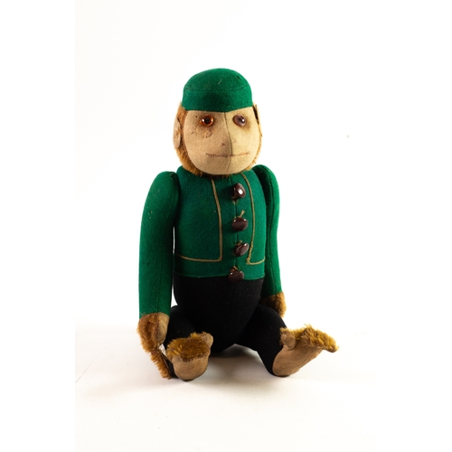 398 - VINTAGE SCHUCO YES/NO BELLHOP MONKEY WITH JOINTED SHOULDERS AND HIPS, felt with green and black cost... 