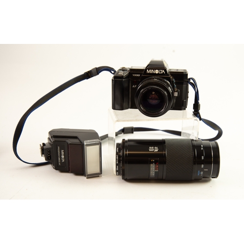 149 - MINOLTA 7000SLR ROLL FILM CAMERA, together with a MINOLTA f:4, 70-210mm ZOOM LENS WITH HOYA SKYLIGHT... 