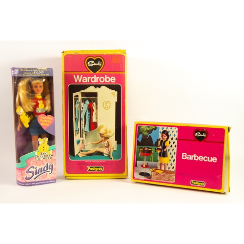 401 - CIRCA 1970's BOXED PEDIGREE 'SINDY' WARDROBE with a SMALL SELECTION OF MANLY KNITTED COSTUME and a B... 