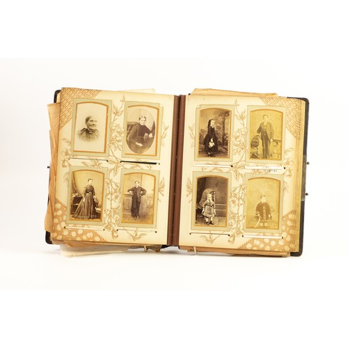 138 - LATE VICTORIAN EMBOSSED LEATHER PHOTOGRAPH ALBUM containing a selection of cabinet photographs, fami... 