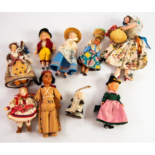 411 - NINE, CIRCA 1960s COSTUME DOLLS OF THE WORLD, an early celluloid example of a boy with painted face ... 