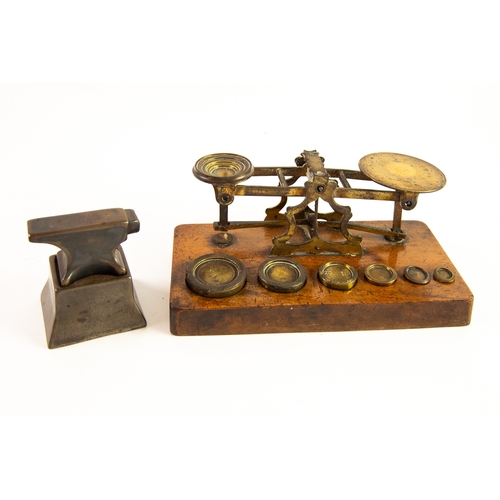 244 - SMALL 19TH CENTURY BRONZE JEWELLERS ANVIL of typical shape (a/f) and the MATCHING STAND, 2 3/4